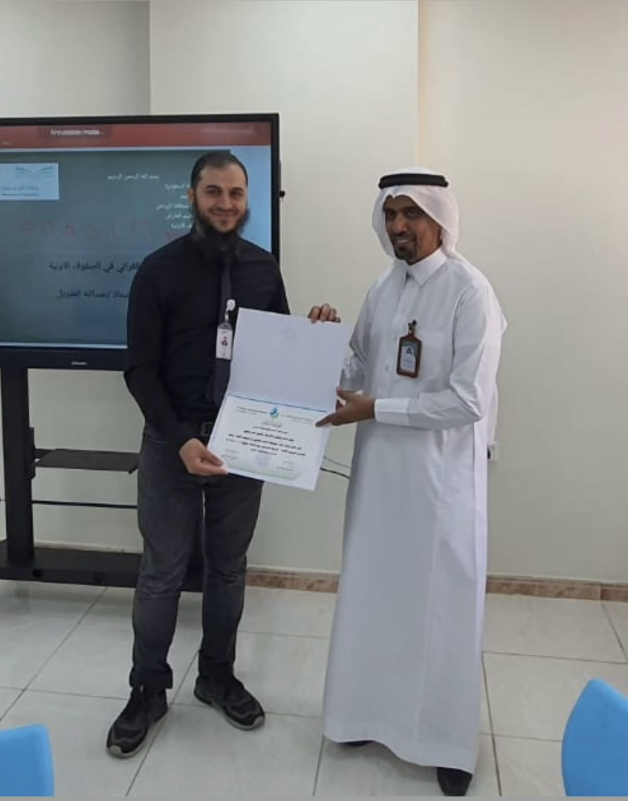 Professor Fathi receiving recognition for teaching